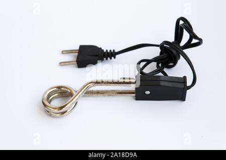 Close up of black handled immersion rod or immersion water heater isolated on white. Stock Photo
