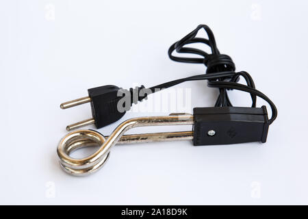 Close up of black handled immersion rod or immersion water heater isolated on white. Stock Photo