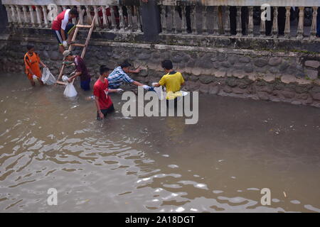 cooperation to clean the river from garbage, clean the river, protect the earth, healthy environment, reject garbage, without plastic, clean water Stock Photo