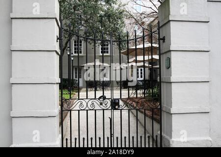 Save Download Preview  Luxury residential house with metal gate in front. Stock Photo