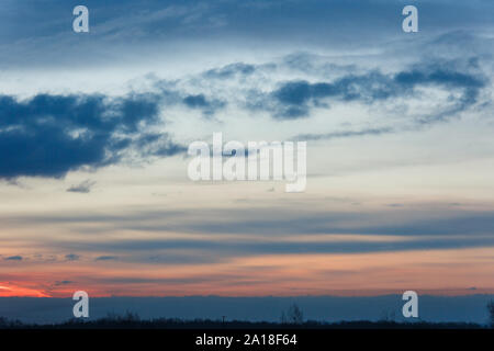 colorful dramatic sky with cloud at sunset Stock Photo