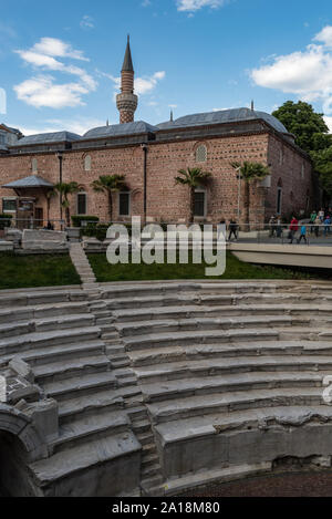 Plovdiv, Bulgaria -May 6, 2019: Djumaya Mosque or Ulu Mosque and Ruins of the Roman Stadium in center of Plovdiv. Stock Photo