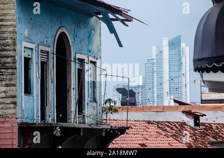 Panama City buildings is seen through the old balconies of Casco Antiguo Stock Photo