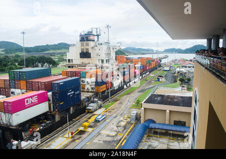 Container ships transiting the Miraflores Locks Stock Photo