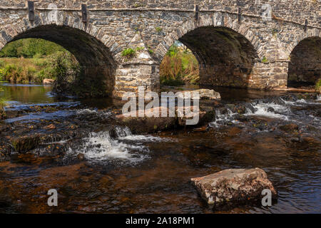 Stone arch bridge at Postbridge on Dartmoor, Devon, England Stock Photo