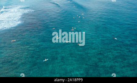 Surfers out by Waikiki in Honolulu, Hawaii, USA Stock Photo