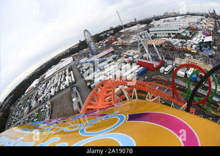 24 September 2019, Bavaria, Munich: Oktoberfest 2019, The Oktoberfest can be seen from the Loopingachterbahn. The largest folk festival in the world lasts until 6 October. Photo: Felix Hörhager/dpa Stock Photo