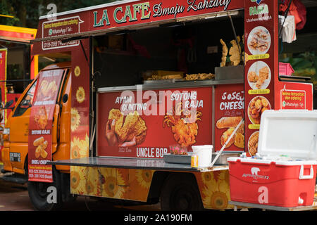 Putrajaya, Malaysia - September 6, 2019 :    Food truck menu, offering Malaysian fried foods. Stock Photo