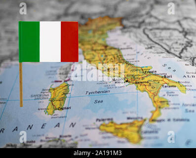Map of Italy with national flag at front Stock Photo