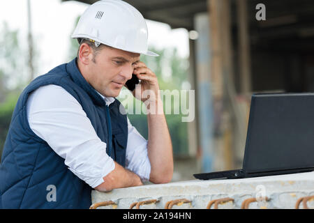 architect supervising a construction outdoords Stock Photo