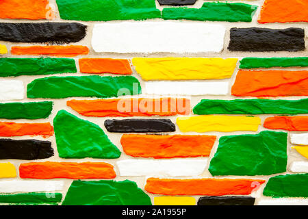 Multicolor textured brick wall close up Stock Photo