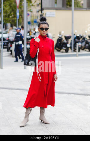 Model wearing a designer dress at her arrival at the Brognano Fashion show in occasion of the Milan Fashion Week Spring - Summer 2020 Stock Photo