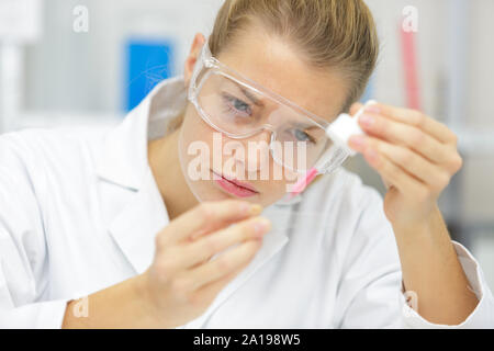 a woman working in perfum lab Stock Photo