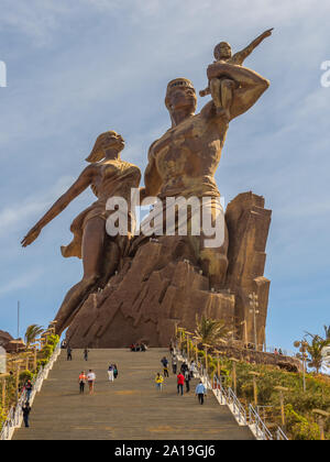 Dakar, Senegal - February 02, 2019: Images of a family at the African Renaissance monument, in the India Teranca Park near the coast. 'Monument de la Stock Photo