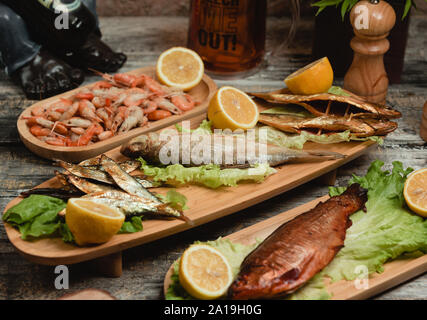 Mixed fried fish with lemon Stock Photo