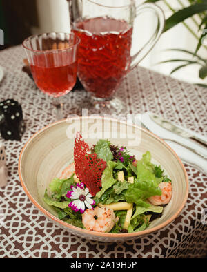 Salad With Shrimp, Arugula ,cucumber And Onion On A White Plate Stock 