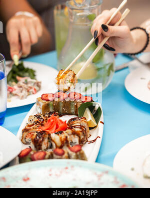 Fried sushi with vegetables and ginger Stock Photo
