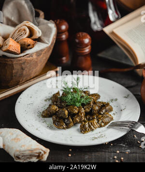 Azeri dolma from grape leaves Stock Photo