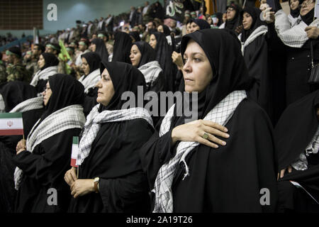 Tehran, Iran. 25th Sep, 2019. The Basij forces gather at the occasion of Holy Defense Week in Tehran, Iran. The Basij (Persian for mobilization) is one of the five forces of the Islamic Revolutionary Guard Corps. The organization originally consisted of civilian volunteers who were urged by Khomeini to fight in the Iran''“Iraq War. Credit: ZUMA Press, Inc./Alamy Live News Stock Photo