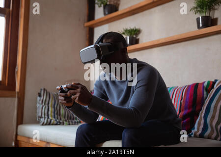 Young man in VR headset Stock Photo