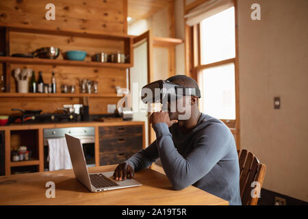 Young man in VR headset Stock Photo