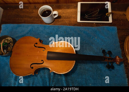Violin being made in a workshop Stock Photo