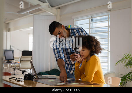 Young business creatives working together in an office Stock Photo