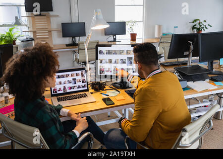 Young business creatives working together in an office Stock Photo