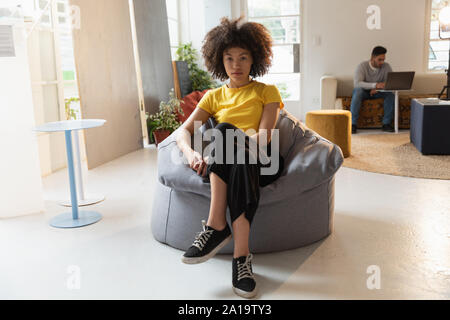 Young business creatives working in an office Stock Photo
