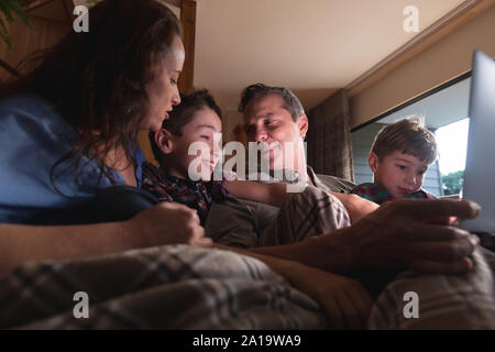 Family enjoying time together at home Stock Photo