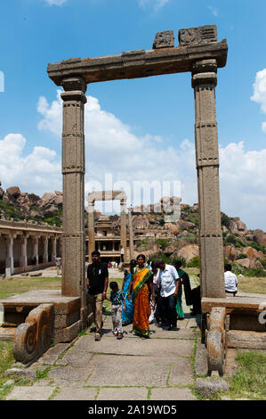 Indian people visiting Chitradurga Fort. Chitradurga is a fortification  that straddles several hills and a peak overlooking a flat area Stock Photo  - Alamy