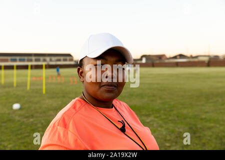 Portrait of female rugby coach on a rugby pitch Stock Photo