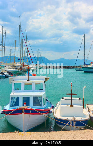 Port of Aegina and two small fishing boats, Saronic Islands, Greece Stock Photo