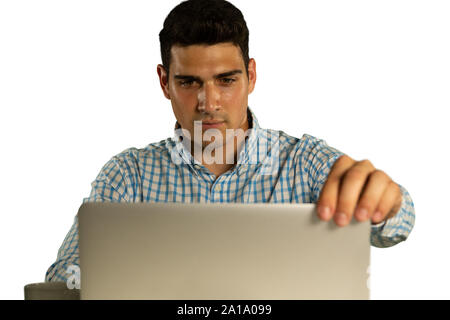 Young businessman using a laptop Stock Photo
