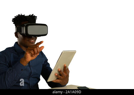 Young businessman using a VR headset Stock Photo