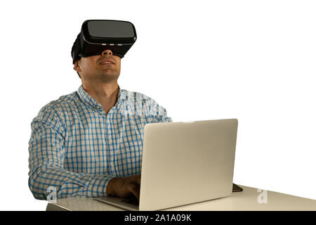 Young businessman using a VR headset Stock Photo
