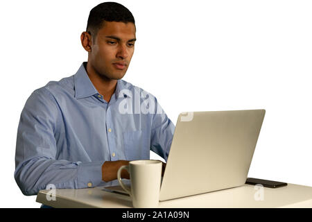 Young businessman using a laptop Stock Photo