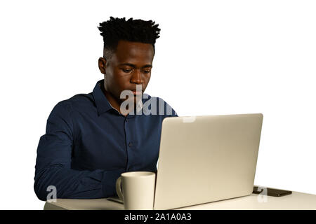 Young businessman using a laptop Stock Photo