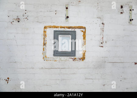 Blank picture hanging on a wall Stock Photo
