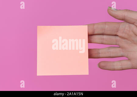 pink sticky note, blank. Stock Photo