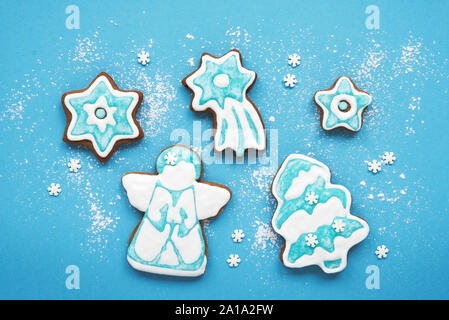 Christmas cookies in the shape of snowflakes, angels, stars and christmas tree handmade Stock Photo