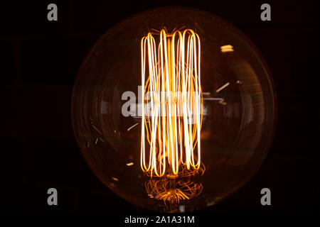 Beautiful decorative filament light bulb - Edison Style Stock Photo