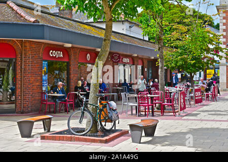 The Costa Coffee Shop on the edge of Saxon Square in Christchurch centre. People at outside tables. Stock Photo