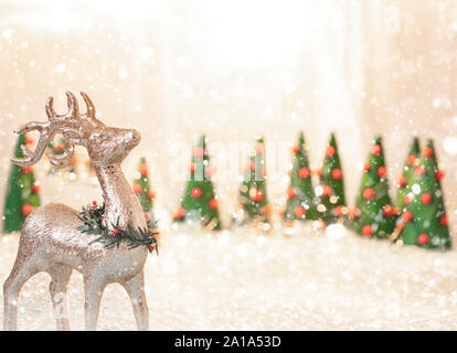 Christmas background with deer, christmas trees and copy space Stock Photo