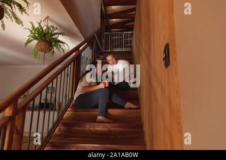 Couple enjoying time together at home Stock Photo