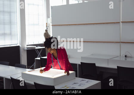 Female students working on a project at a fashion college Stock Photo