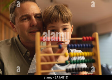 Father and son enjoying time together at home Stock Photo