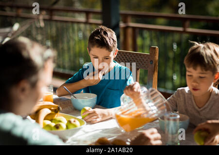 Family enjoying time together at home Stock Photo