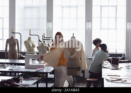 Female student working on a project at a fashion college Stock Photo
