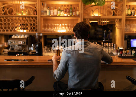 Young man in a bar Stock Photo